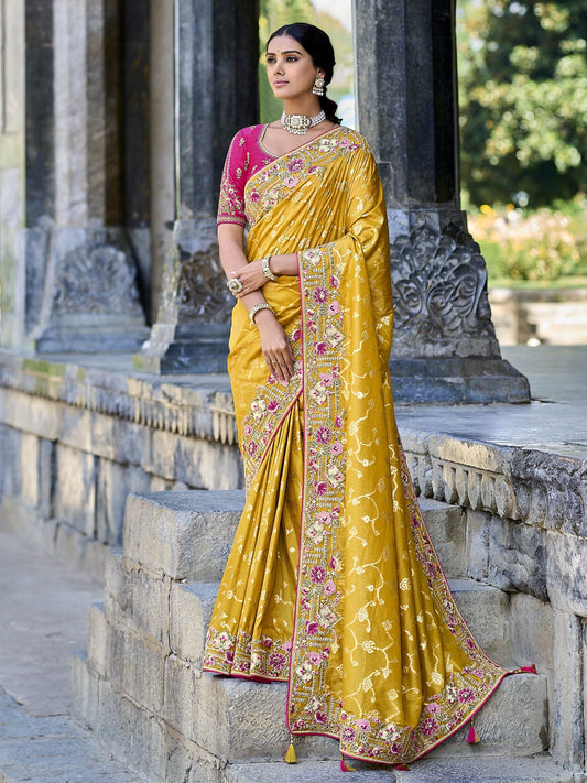 yellow gadwal silk saree with pink silk blouse and exquisite handwork