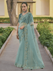 Turquoise Embroidered Organza Silk Saree