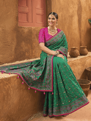 Enticing Green Mirror Work Banarasi Silk Saree With Blouse