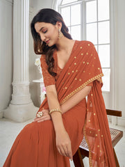 Rust Ethnic Motifs Sequinned Poly Georgette Saree