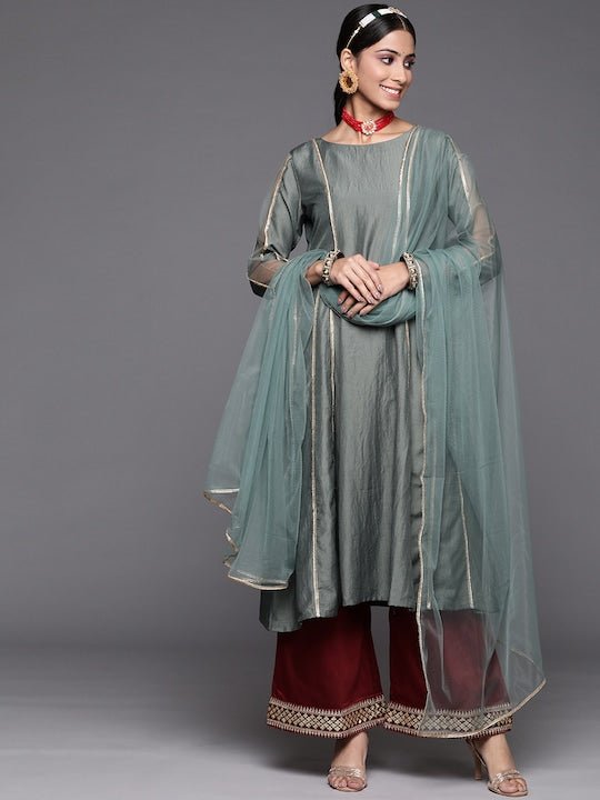 Ethnic Motifs Silk Blend Bling It On Kurta Set - Inddus.com