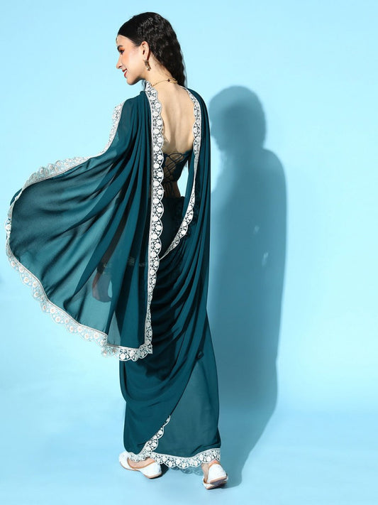 Teal Saree with Embroidered border - Inddus.com