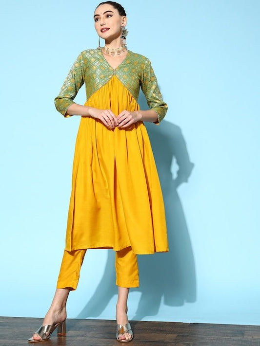 Women Mustard Yellow Pleated Kurta with Trousers - Inddus.com