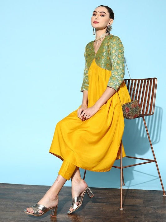 Women Mustard Yellow Pleated Kurta with Trousers - Inddus.com