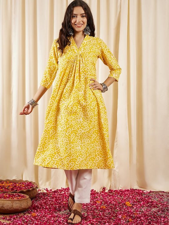 Yellow Batik Printed V-Neck A-Line Kurta - Inddus.com